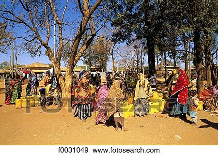 Ethiopia, region of Harar, Somali women waiting for water View Large Photo Image Stock Photo - Ethiopia, region of Harar, Somali women waiting for water. Fotosearch