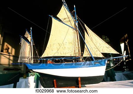 Stock Photo - France, Brittany, Cancale, model of an old fishing boat. Fotosearch