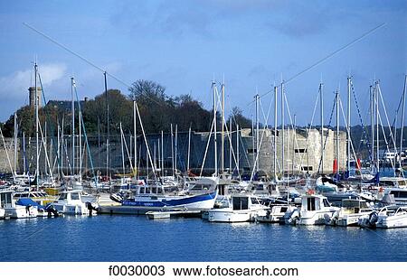 Stock Image - France, Brittany, Concarneau, the marina and the ramparts. Fotosearch