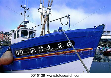Stock Photo - France, Brittany, Douarnenez, docked boat. Fotosearch