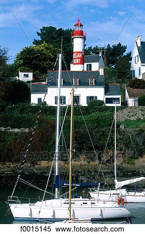 France, Brittany, Doëlan, port and lighthouse View Large Photo Image Stock Photography - France, Brittany, Doëlan, port and lighthouse. Fotosearch