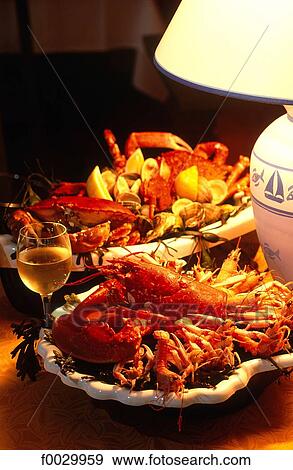France, Brittany, tray of seafood with lobster, crabs and scampis View Large Photo Image Stock Photo - France, Brittany, tray of seafood with lobster, crabs and scampis. Fotosearch