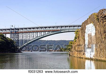 United States, New York, cruise around Manhattan island, giant C for Columbia university and Henry Hudson bridge View Large Photo Image Stock Image - United States, New York, cruise around Manhattan island, giant C for Columbia university and Henry Hudson bridge. Fotosearch