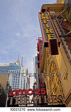 Stock Image - United States, New York, Manhattan, near Times square, facade of the Empire Theatre. Fotosearch