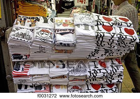 United States, New York, Manhattan, near Times square, souvenirs shop, tee-shirts View Large Photo Image Stock Image - United States, New York, Manhattan, near Times square, souvenirs shop, tee-shirts. Fotosearch