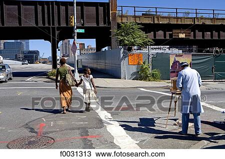 Stock Image - United States, New York, Manhattan, street scene, painter. Fotosearch