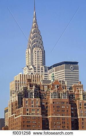 United States, New York, Manhattan, habitations buildings and Chrysler Building at back View Large Photo Image Stock Photo - United States, New York, Manhattan, habitations buildings and Chrysler Building at back. Fotosearch