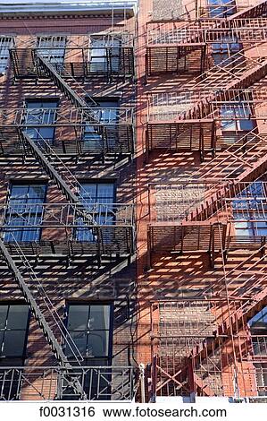 United States, New York, Manhattan, buildings facades with outdoor stairs View Large Photo Image Stock Photograph - United States, New York, Manhattan, buildings facades with outdoor stairs. Fotosearch