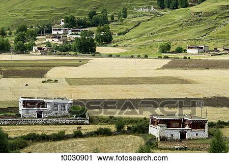 Stock Image - China, Sichuan, between Daofu and Danba, landscape and village. Fotosearch