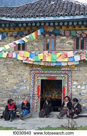 China, Sichuan, between Wenchuan and Dujiangyan, women by a little Tibetan temple View Large Photo Image Stock Image - China, Sichuan, between Wenchuan and Dujiangyan, women by a little Tibetan temple. Fotosearch