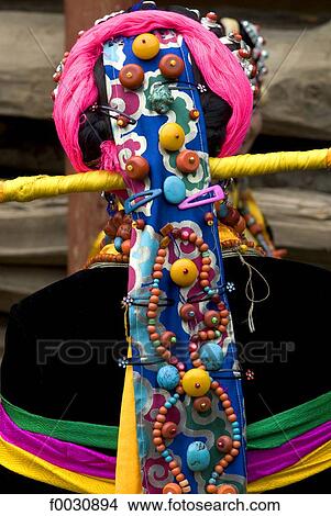 China, Sichuan, near Danba, Tibetan village festival, detail of woman coiffure View Large Photo Image Picture - China, Sichuan, near Danba, Tibetan village festival, detail of woman coiffure. Fotosearch