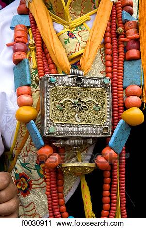 China, Sichuan, near Danba, Tibetan traditional jewels wearing during a village festival View Large Photo Image Stock Image - China, Sichuan, near Danba, Tibetan traditional jewels wearing during a village festival. Fotosearch