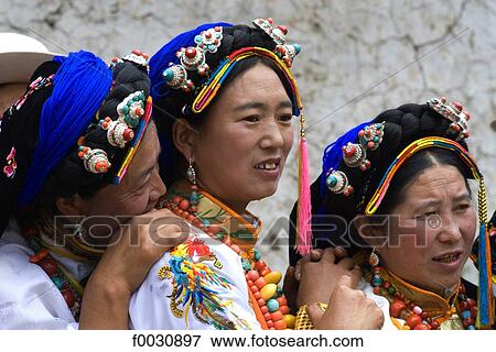 China, Sichuan, near Danba, Tibetan village festival, women with traditional headdress View Large Photo Image Stock Photo - China, Sichuan, near Danba, Tibetan village festival, women with traditional headdress. Fotosearch