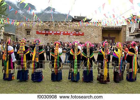 China, Sichuan, near Danba, Tibetan village festival, dance in traditional costume View Large Photo Image Stock Photo - China, Sichuan, near Danba, Tibetan village festival, dance in traditional costume. Fotosearch