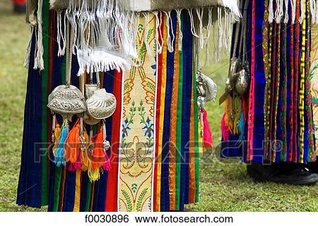 China, Sichuan, near Danba, Tibetan village festival, detail of woman costume View Large Photo Image Stock Photograph - China, Sichuan, near Danba, Tibetan village festival, detail of woman costume. Fotosearch