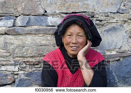 Stock Photograph - China, Sichuan, Tibetan woman portrait. Fotosearch