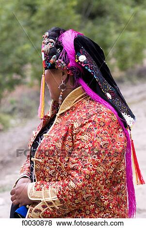 Stock Photo - China, Sichuan, Tibetan woman with traditional headdress. Fotosearch