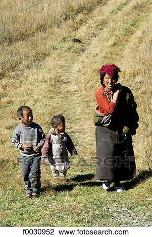 China, Sichuan, woman and her children View Large Photo Image Stock Image - China, Sichuan, woman and her children. Fotosearch