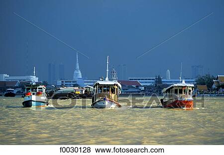 Thailand, Bangkok, Chao Praya river, tugboats tracting barges View Large Photo Image Stock Photo - Thailand, Bangkok, Chao Praya river, tugboats tracting barges. Fotosearch