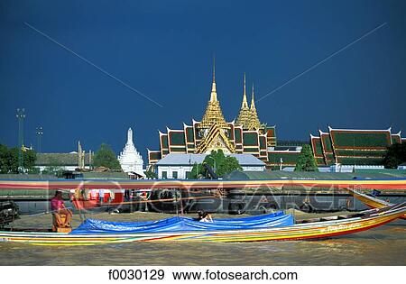 Thailand, Bangkok, Chao Praya river, barge and water taxi by a temple View Large Photo Image Stock Photo - Thailand, Bangkok, Chao Praya river, barge and water taxi by a temple. Fotosearch