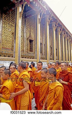 Stock Image - Thailand, Bangkok, the royal palace, monks. Fotosearch