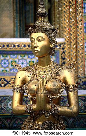 Stock Photography - Thailand, Bangkok, Wat Phra Keo temple, statue. Fotosearch