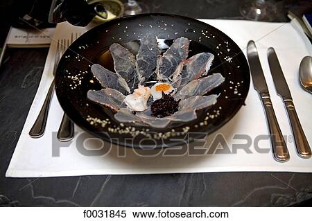 Stock Photography - Vietnam, Hanoi, fish dish.. Fotosearch