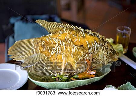 Stock Image - Vietnam, Ho Chi Minh city, fish dish.. Fotosearch