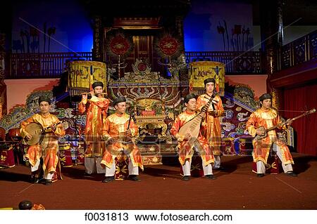 Stock Image - Vietnam, Hue, Imperial city, musicians in traditional costumes.. Fotosearch