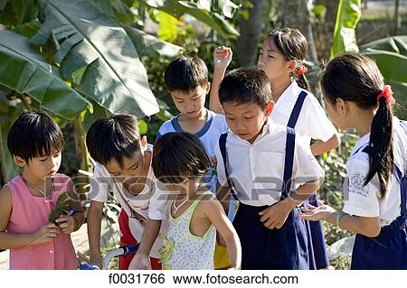 Vietnam, village by Mang Thit river, children. View Large Photo Image Stock Photograph - Vietnam, village by Mang Thit river, children.. Fotosearch