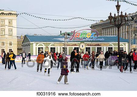 Stock Photograph - Russia, St Petersburg, palace square, ice rink.. Fotosearch