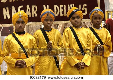 Stock Photo - India, New Delhi, anniversary of the martyr of Guru Tegh Baradur, young sikhs.. Fotosearch