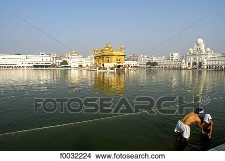 India, Punjab, Amritsar, the Golden Temple, pool of nectar. View Large Photo Image Picture - India, Punjab, Amritsar, the Golden Temple, pool of nectar.. Fotosearch