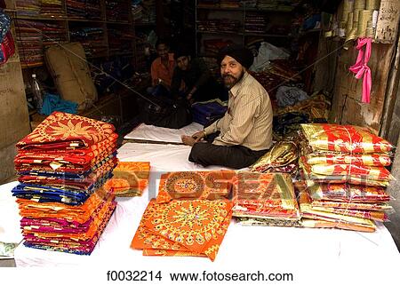 India, Punjab, seller of fabrics View Large Photo Image Picture - India, Punjab, seller of fabrics. Fotosearch