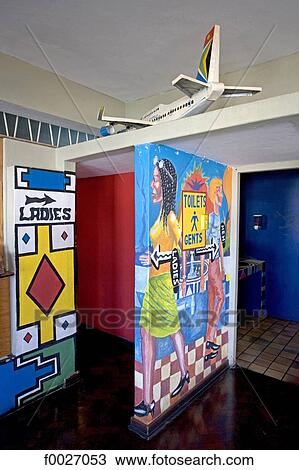 Stock Image - South Africa, Zululand, Durban, fresco at the entrance of toilets. Fotosearch