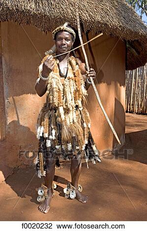 Stock Image - South Africa, Zululand, Thembalethu, village chief wearing dress suit. Fotosearch
