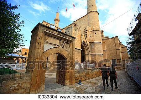 Picture - Cyprus, Nicosia, the mosque of Selim, soldiers. Fotosearch