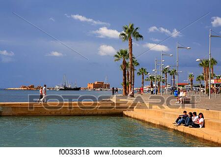Stock Photo - Cyprus, Paphos, seawater pool, the port and the Paphos castle. Fotosearch