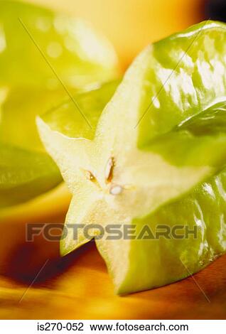 A sliced carambola View Large Photo Image Stock Image - A sliced carambola. Fotosearch