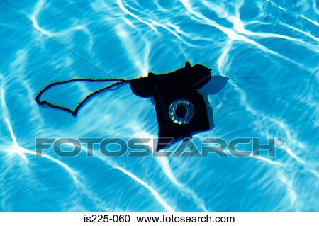 A telephone on the bottom of a swimming pool View Large Photo Image Stock Image - A telephone on the bottom of a swimming pool. Fotosearch