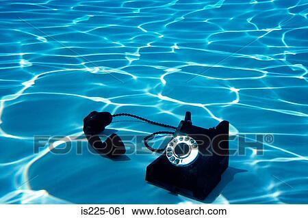 A telephone on the bottom of a swimming pool View Large Photo Image Stock Image - A telephone on the bottom of a swimming pool. Fotosearch