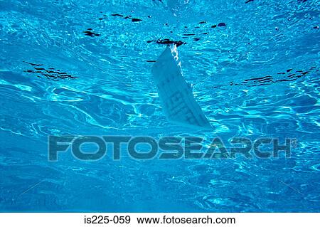 Stock Photo - An obscure object in a swimming pool. Fotosearch