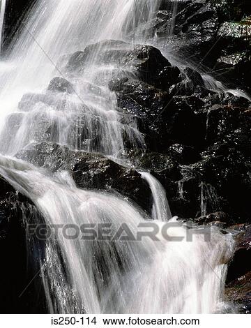 Picture - cascade, motion, rocks, spray, stream. Fotosearch