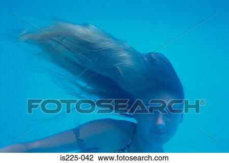 Girl swimming with hair to the side View Large Photo Image Stock Image - Girl swimming with hair to the side. Fotosearch