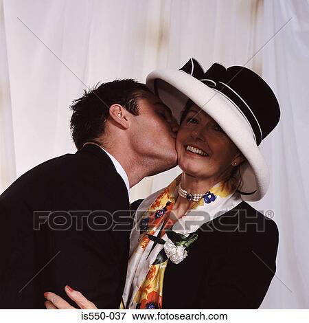 Groom kisses his mother View Large Photo Image Stock Photo - Groom kisses his mother. Fotosearch