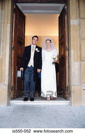 The newly-weds leaving church View Large Photo Image Stock Image - The newly-weds leaving church. Fotosearch