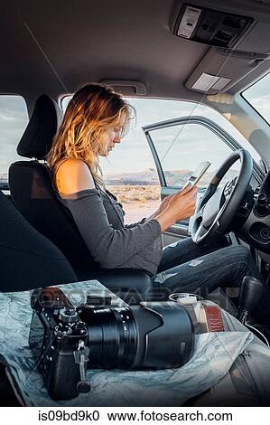A female photographer exploring the wilderness of Southern Utah with an off road vehicle and digital devices. View Large Photo Image Stock Image - A female photographer exploring the wilderness of Southern Utah with an off road vehicle and digital devices.. Fotosearch