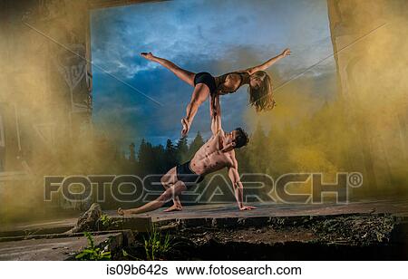 Acrobats performing on outdoor stage, Bainbridge, Washington, USA View Large Photo Image Stock Photograph - Acrobats performing on outdoor stage, Bainbridge, Washington, USA. Fotosearch