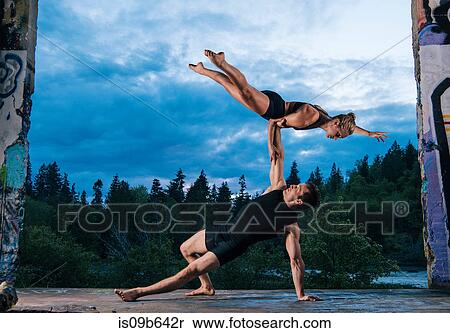 Acrobats performing on outdoor stage, Bainbridge, Washington, USA View Large Photo Image Stock Photography - Acrobats performing on outdoor stage, Bainbridge, Washington, USA. Fotosearch
