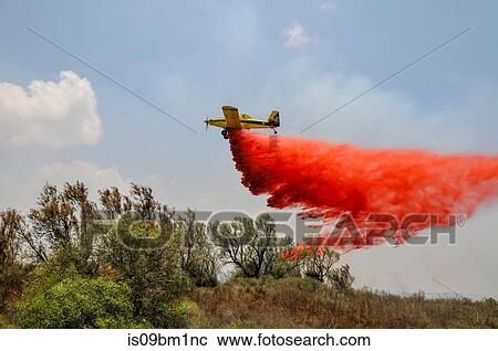 Aircraft drops fire retardant on a fire caused by Palestinian Kite bombs flown from Gaza to set fire to Israeli fields and crops. July 13, 2018 on the Israel Palestine (Gaza) Border View Large Photo Image Stock Image - Aircraft drops fire retardant on a fire caused by Palestinian Kite bombs flown from Gaza to set fire to Israeli fields and crops. July 13, 2018 on the Israel Palestine (Gaza) Border. Fotosearch